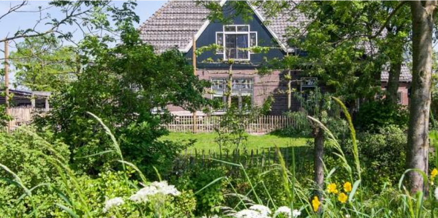 Buitenaanzicht boerderij De Fryhof